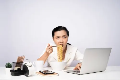 Developer eating unhealthy delivery food because there is no time to cook